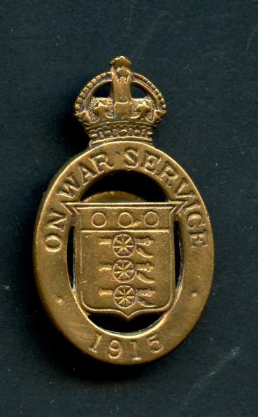 WW1 On War Service 1915 munition workers badge. ( Maker  D.C.Collins )