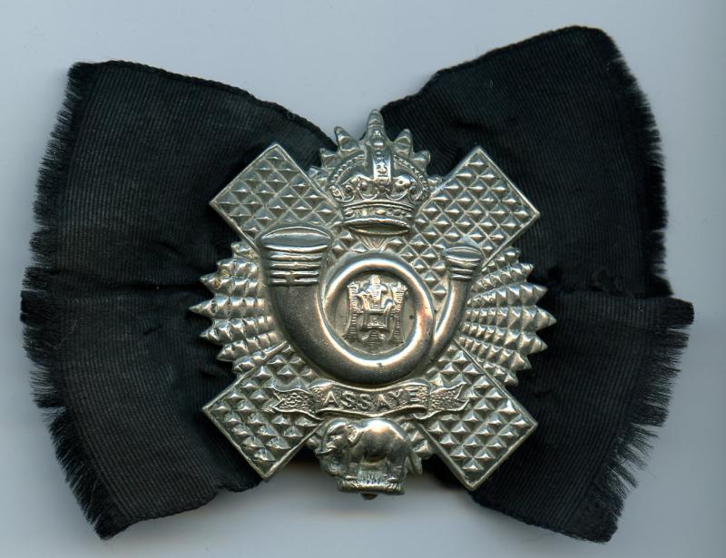 Highland Light Infantry H.L.I. Cap Badge With Black Ribbon Backing